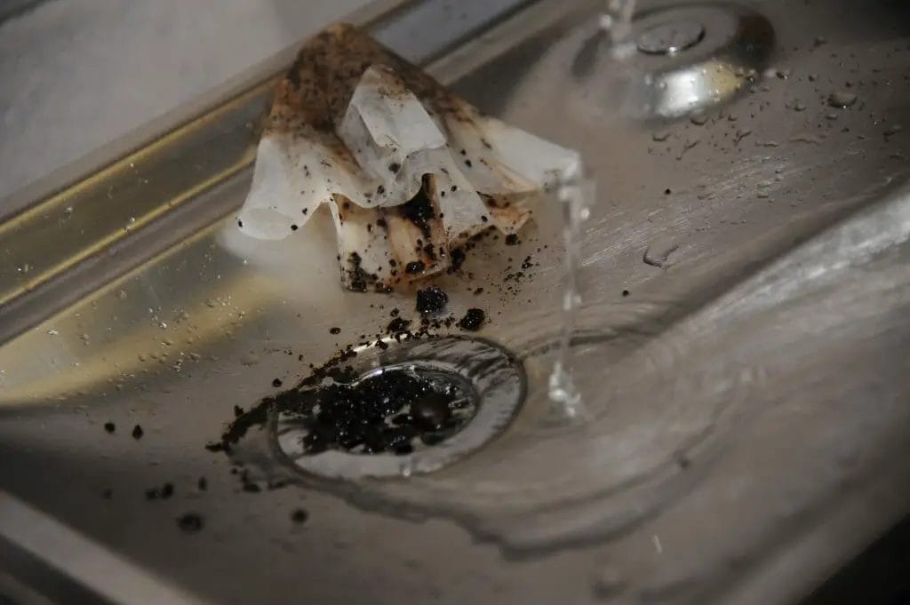 coffee grounds clog a garbage disposal