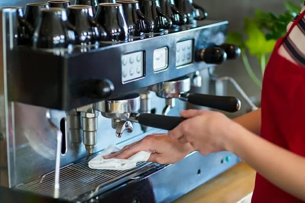 How do you clean a descaling espresso machine?