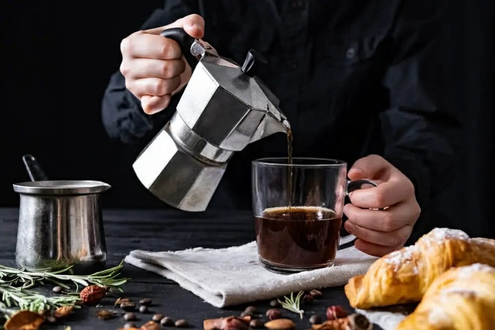 What are the drawbacks of a coffee percolator?