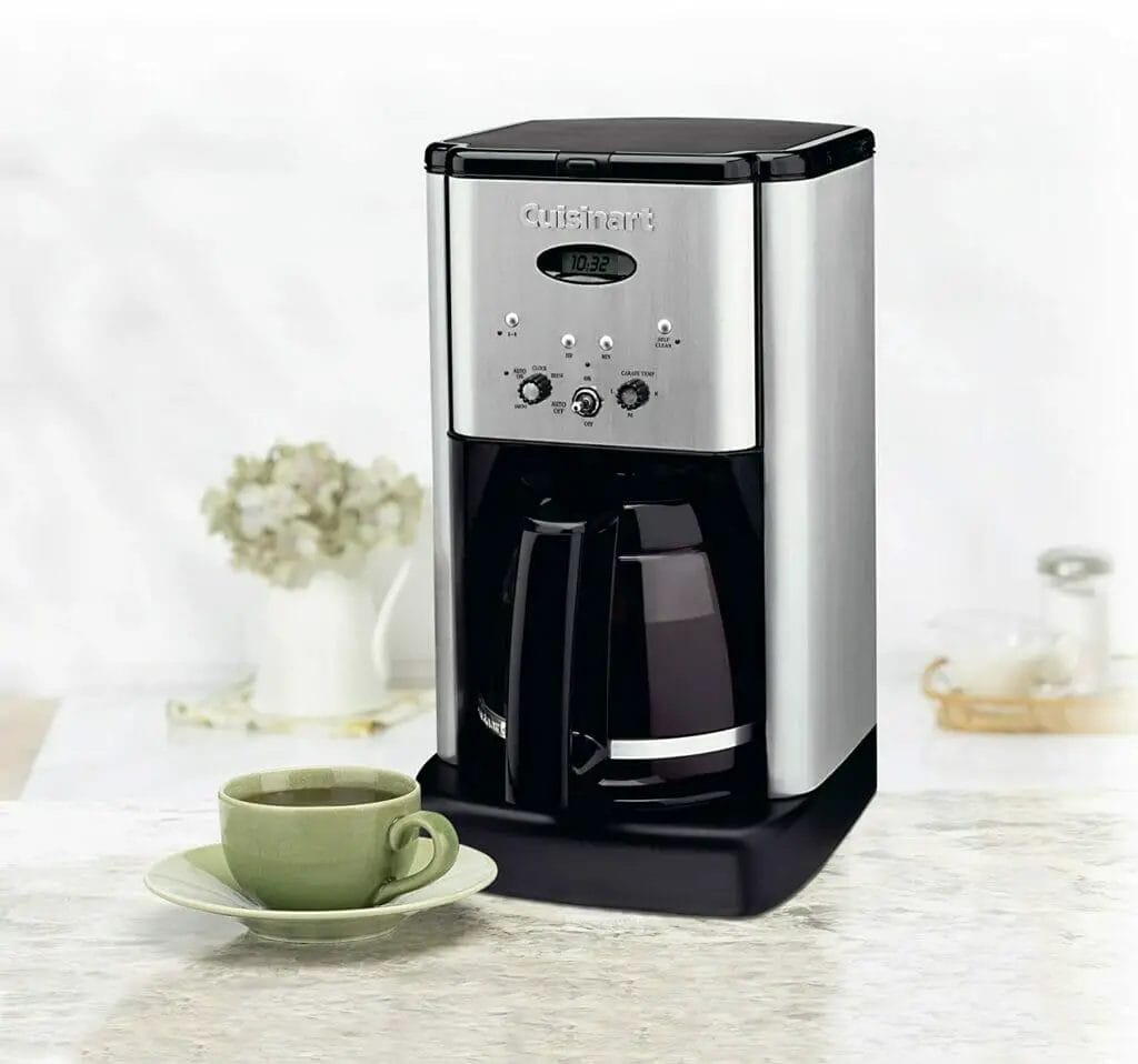 What does the bold button on the coffee maker do?
