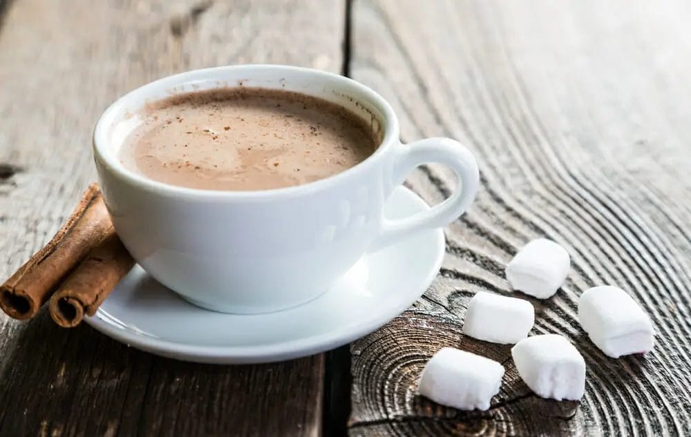 Can you put cocoa powder in a coffee machine?